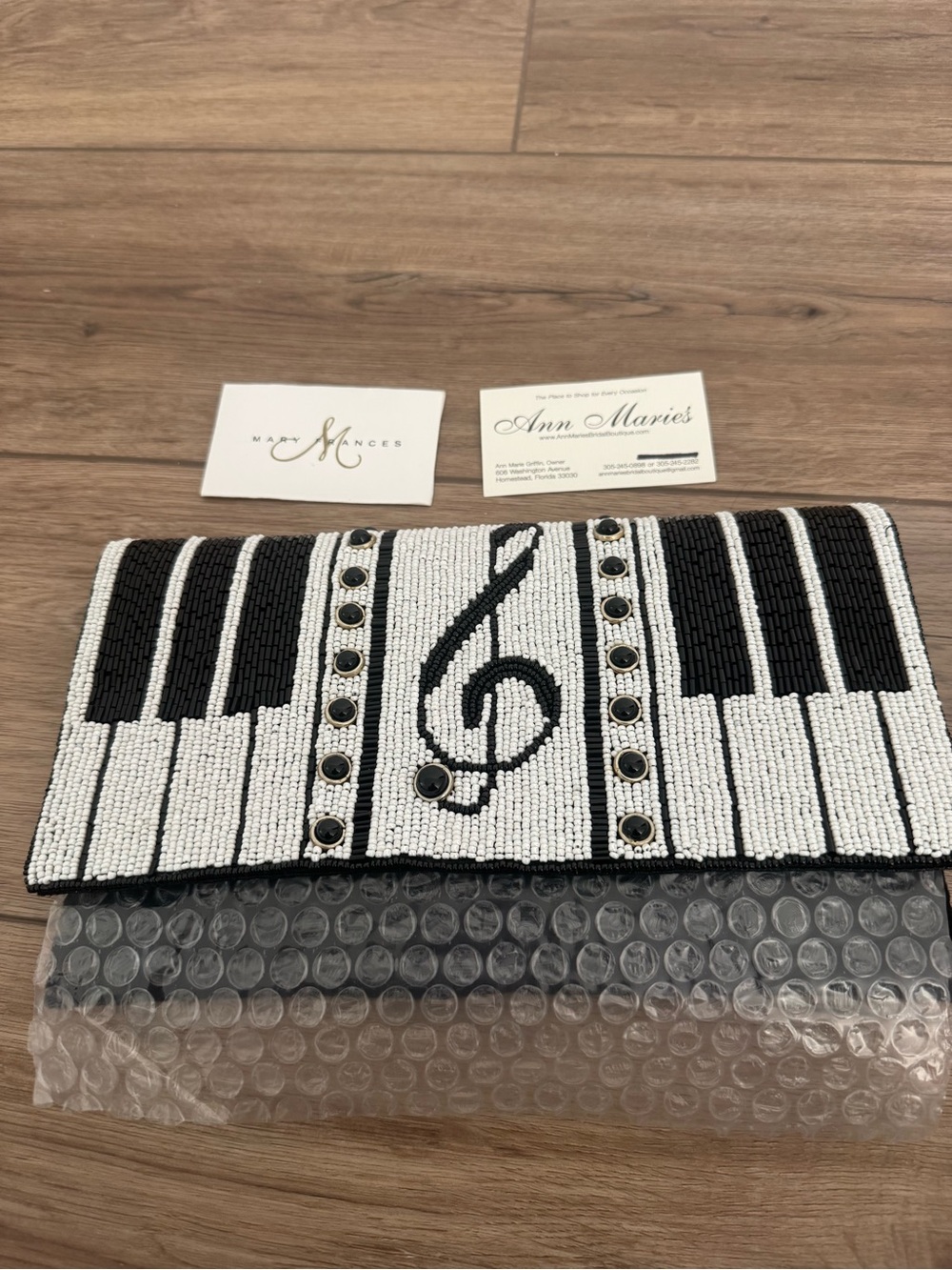 Mary Frances Black & White Piano Keyboard Beaded Clutch with Treble Clef